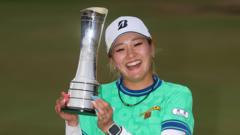 Kuwaki beats Henseleit in play-off to win Women's Open