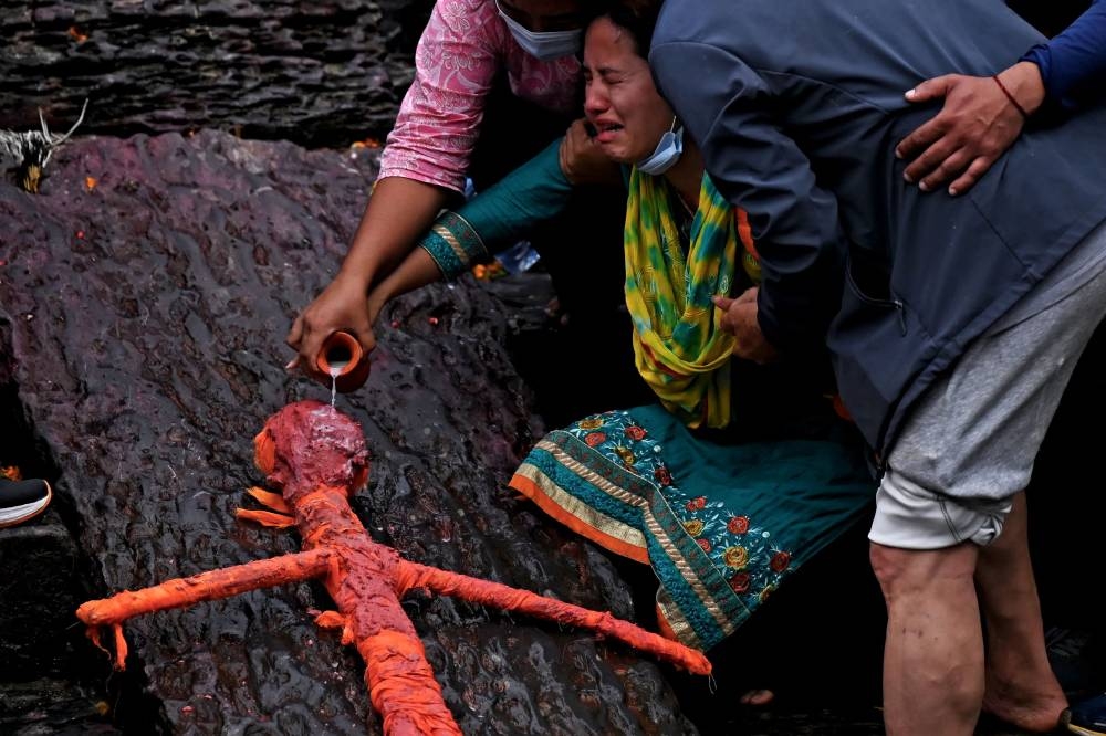 Symbolic funerals held in Nepal for missing flood victims