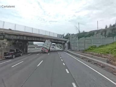 WATCH: Video shows moment tractor trailer hits overpass