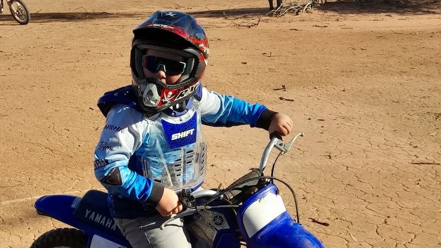 Boy, 10, clotheslined by wire on remote dirt bike track