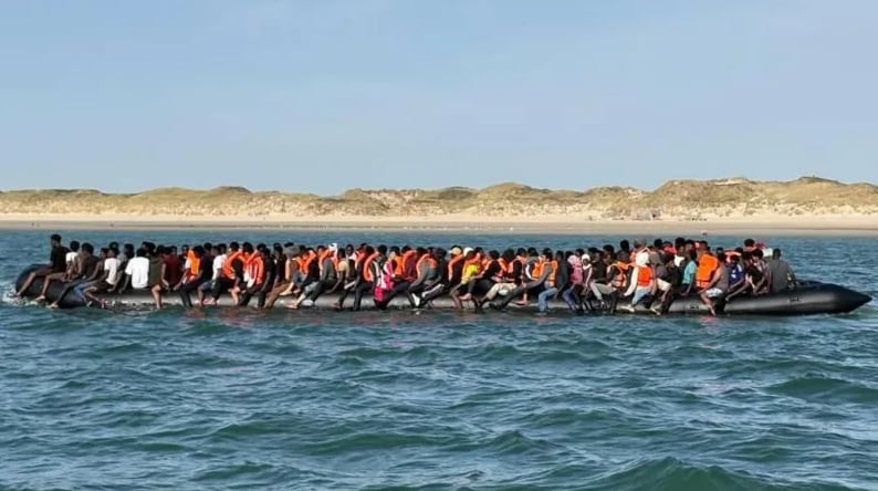 'Mega dinghy' carrying 230 migrants across Channel shows crackdown is working, says UK minister