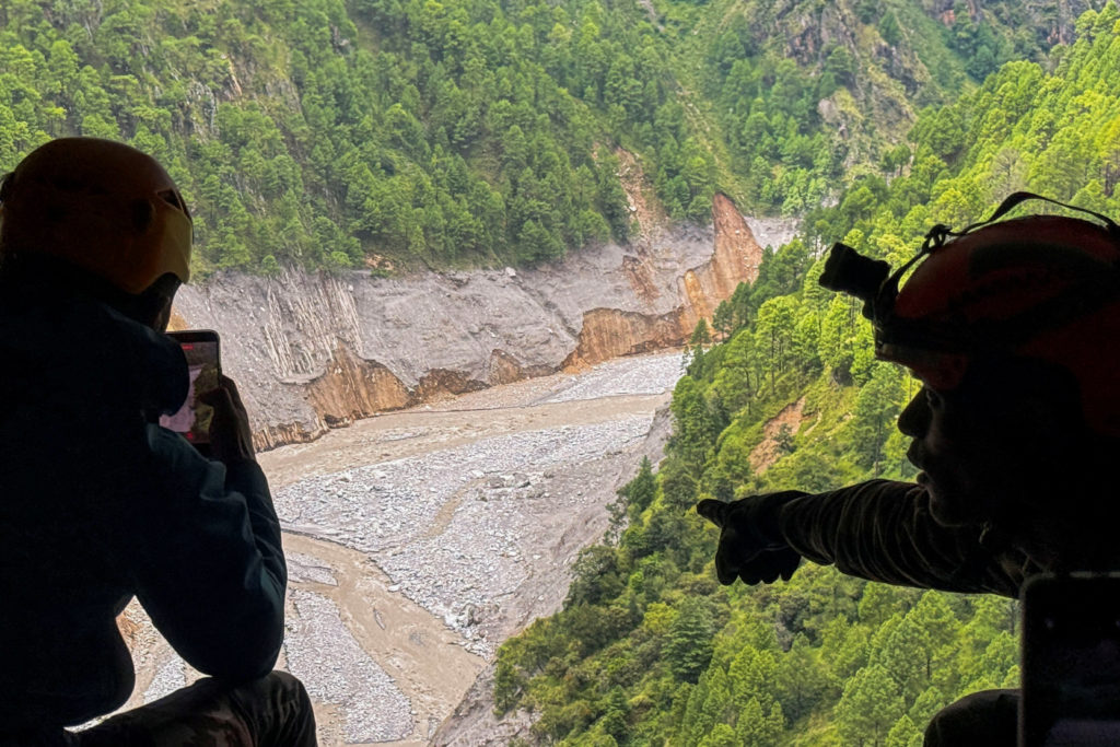Rescuers pull 2 trapped workers from a hydropower tunnel 9 days after Nepal floods