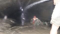 Nepal rescuers try to reach dozens trapped in tunnel after two found alive