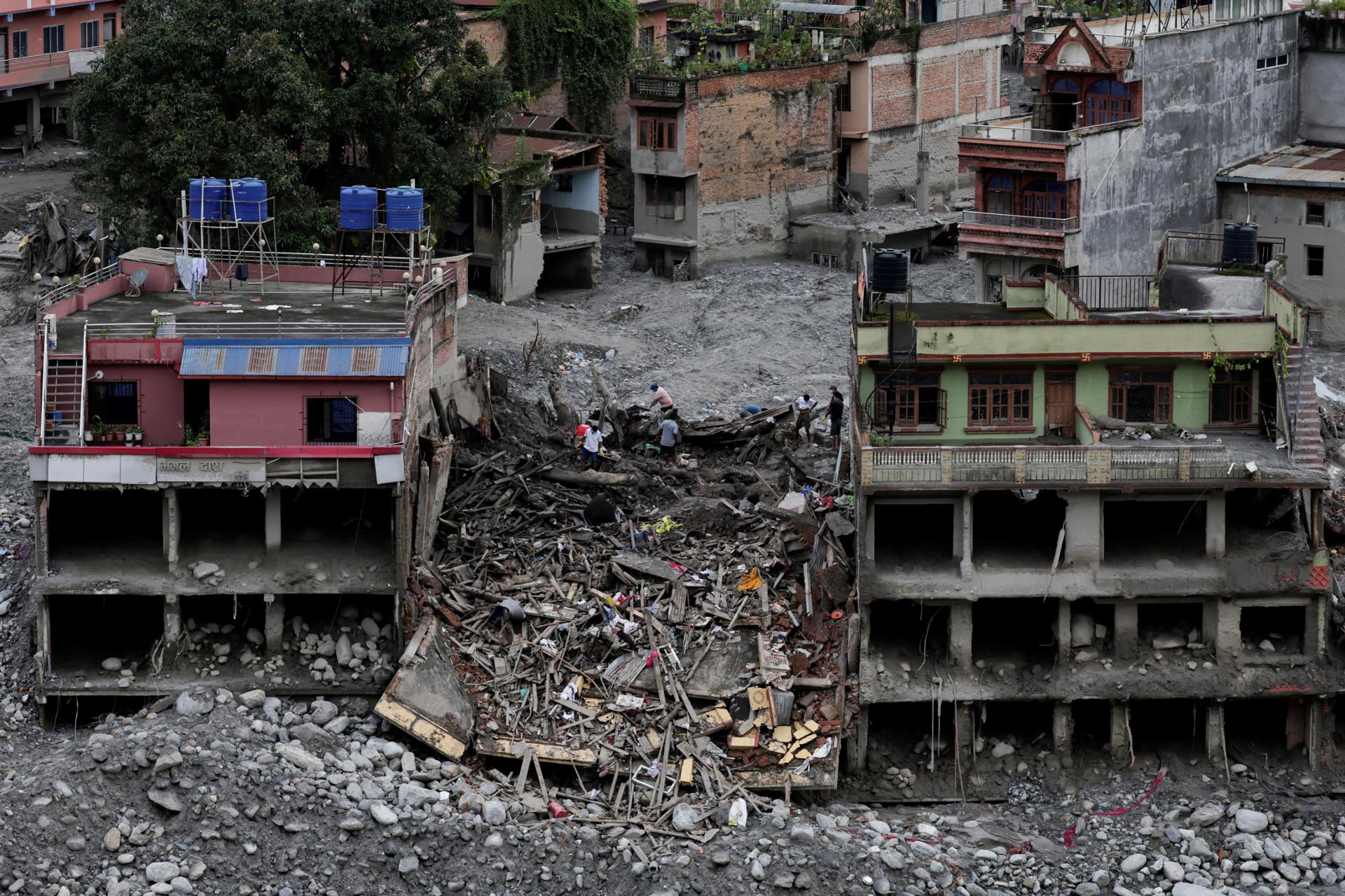 Rescuers in Nepal pull Chinese national, woman alive 10 days after floods