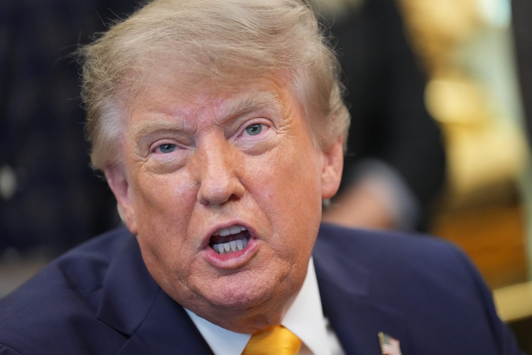 Trump calls the Iran war — which has left 18 U.S. service members dead — ‘small potatoes’ and backs Vance’s view that it’s not a war
