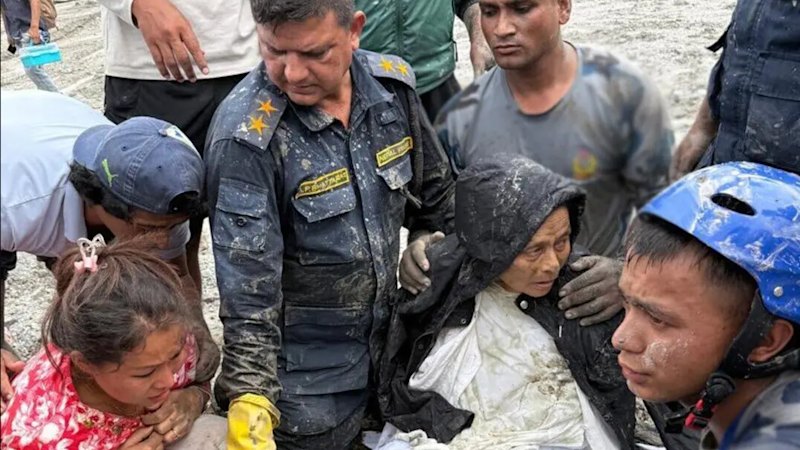 She was given up for dead, then a faint cry came from the depths of the mud