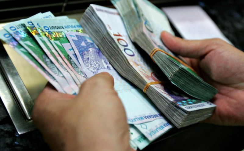 Ringgit opens slightly higher against US dollar