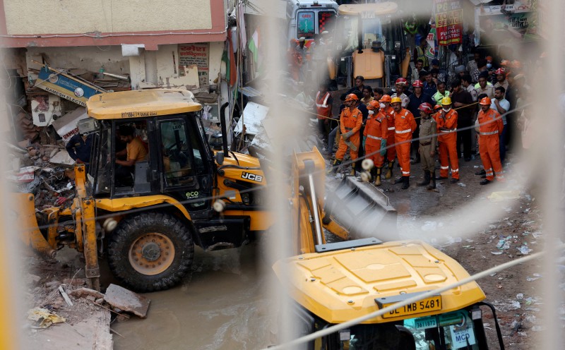 India teams search for trapped after deadly Delhi building collapse