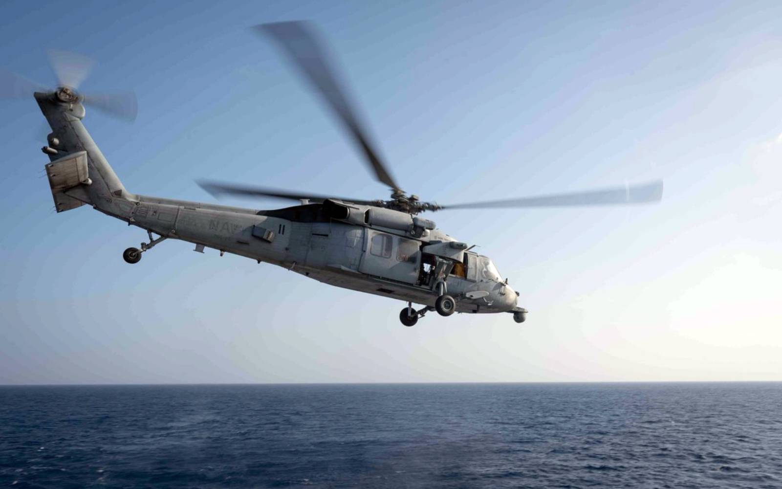 US helicopter fires on ship trying to break Iran ports blockade