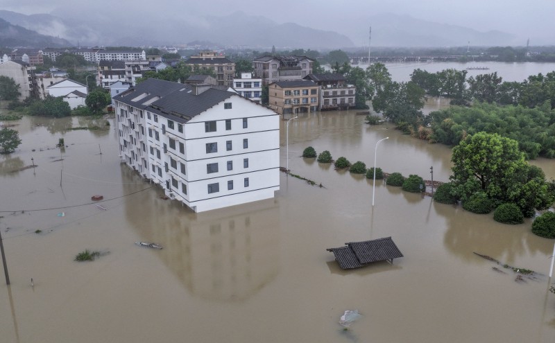 Typhoon Dolphin unleashes floods across China, Beijing hit