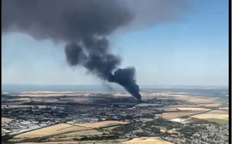 Large fire near France's Charles de Gaulle airport closes two runways