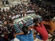 Mass funeral held in Gaza for dozens of bodies, including kids, found under the rubble