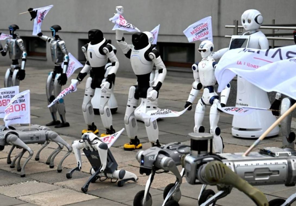 Robots protest for rules on AI and jobs