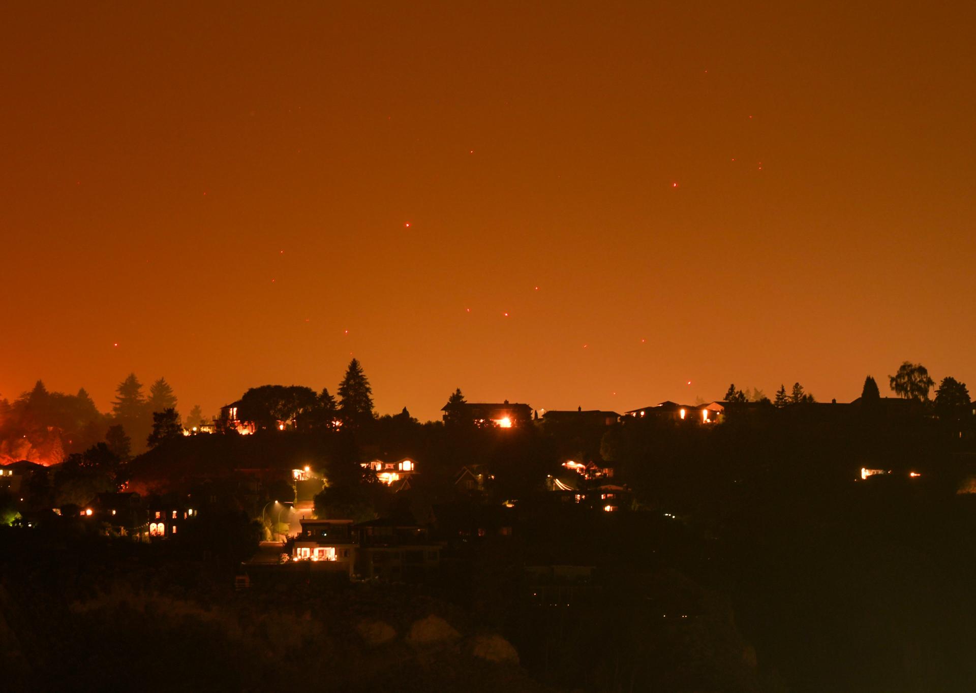 Wildfire in western Canada that forced 20,000 to flee grew overnight