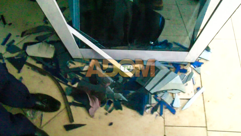 Glass door breaks as anxious parents seek SHS placement for wards at GNAT Hall (Photos)
