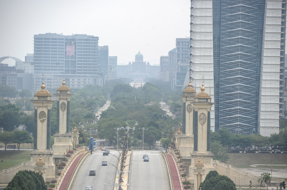 Putrajaya chokes as unhealthy air readings climb across Malaysia