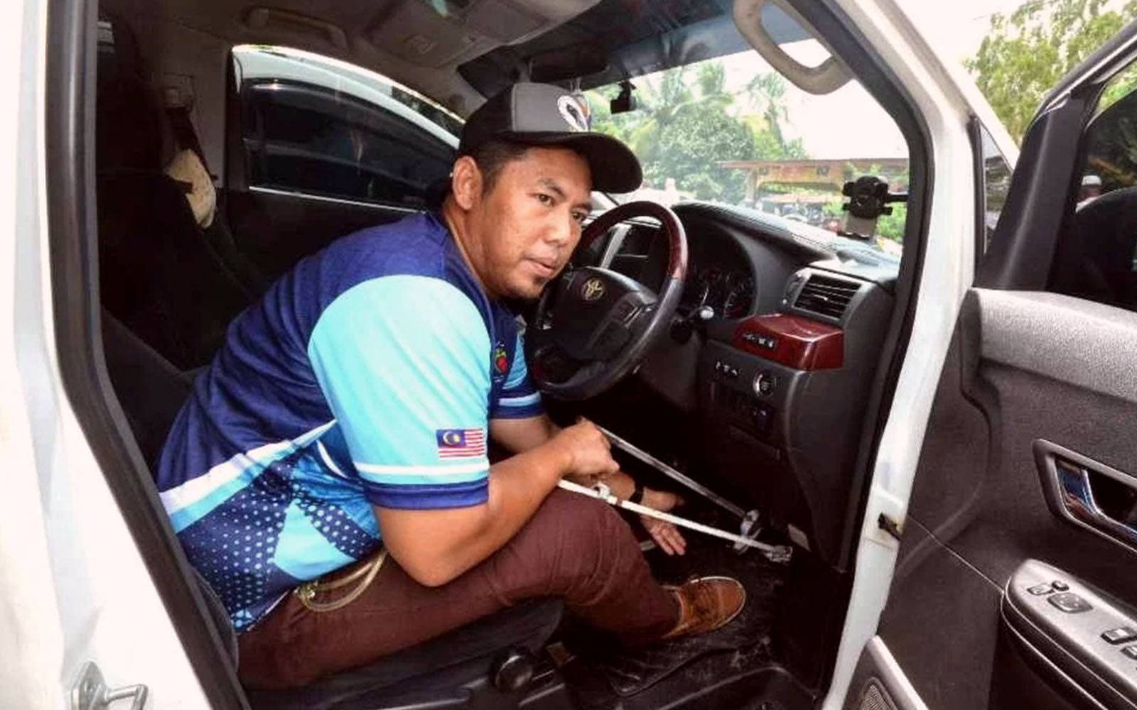 Shahrul Nizam finds purpose behind the wheel after paralysis