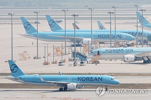 (LEAD) Asiana shareholders approve merger with Korean Air