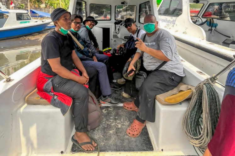 Search intensifies for journalists, crew as Anak Krakatau ashfall eases