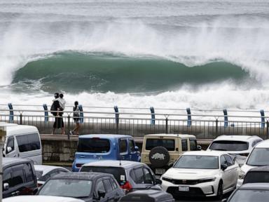Tropical storm hits Tokyo area, leaving thousands without power before moving west