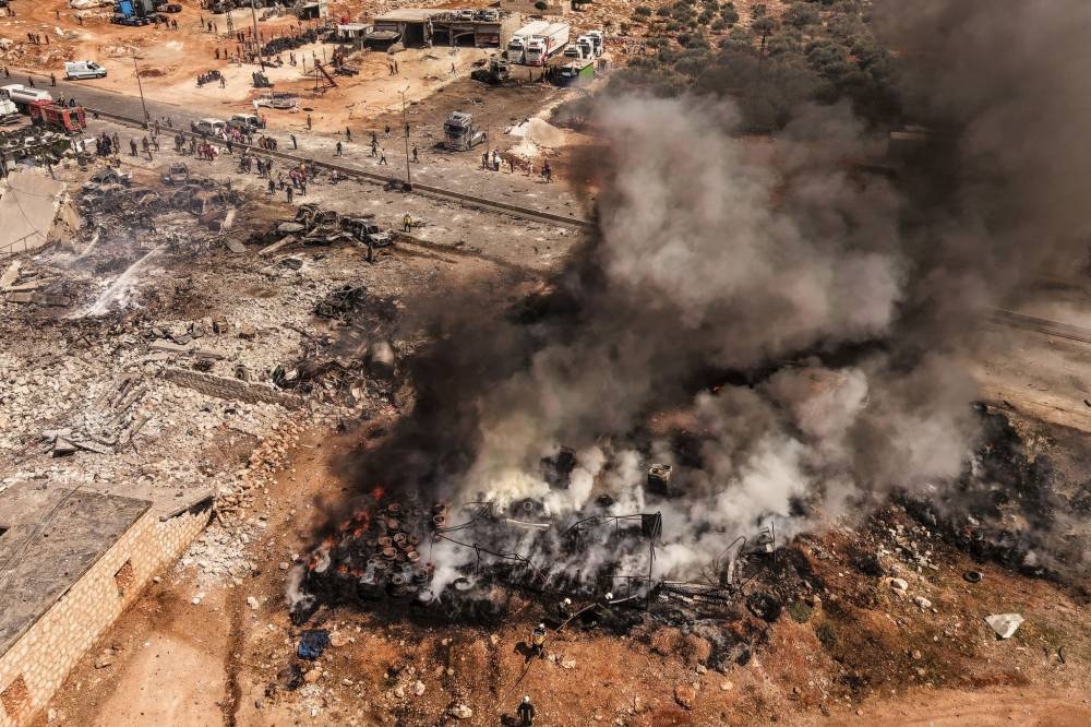 Massive blast at weapons depot in Syria kills 14