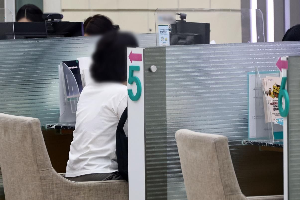 Curbs on loans drive borrowers to higher-cost savings banks