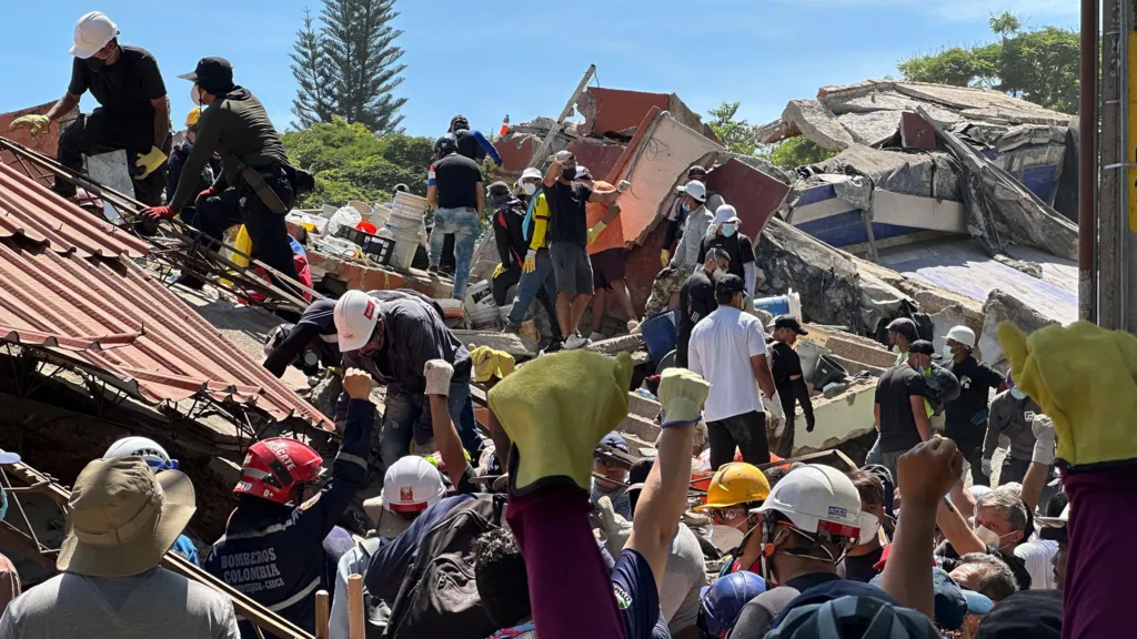 Brother of man trapped under rubble in Colombian quake clings on to hope