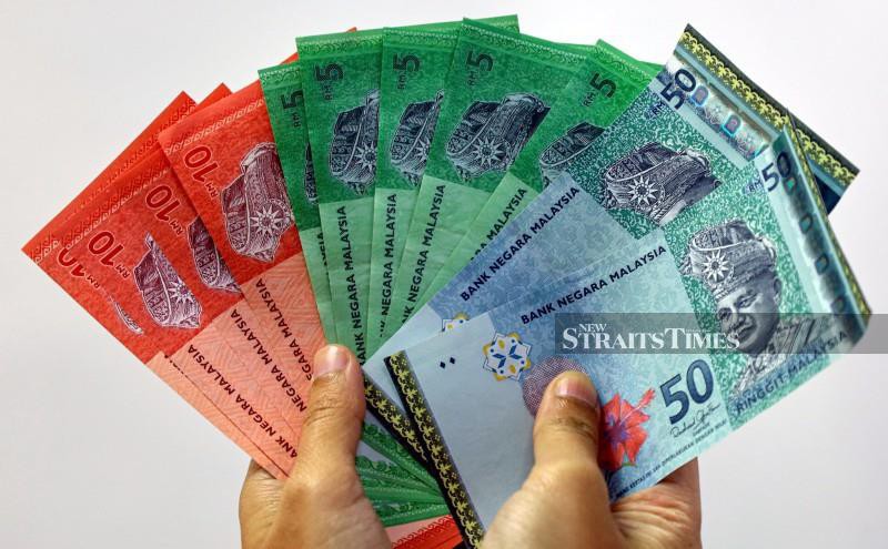 Ringgit ends higher vs greenback ahead of US inflation data