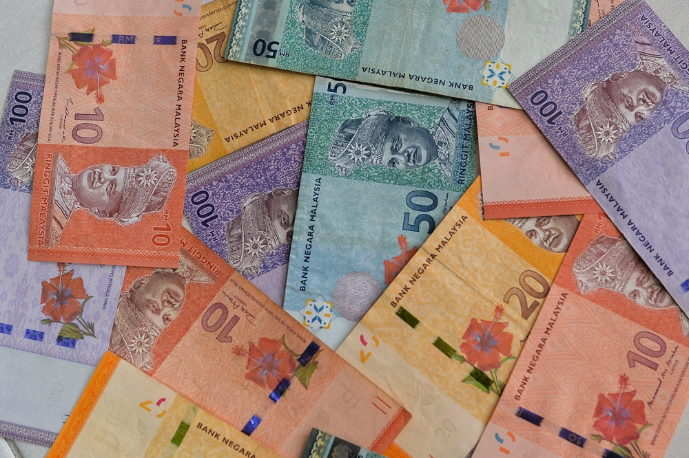 Ringgit ends higher vs US dollar ahead of US inflation data