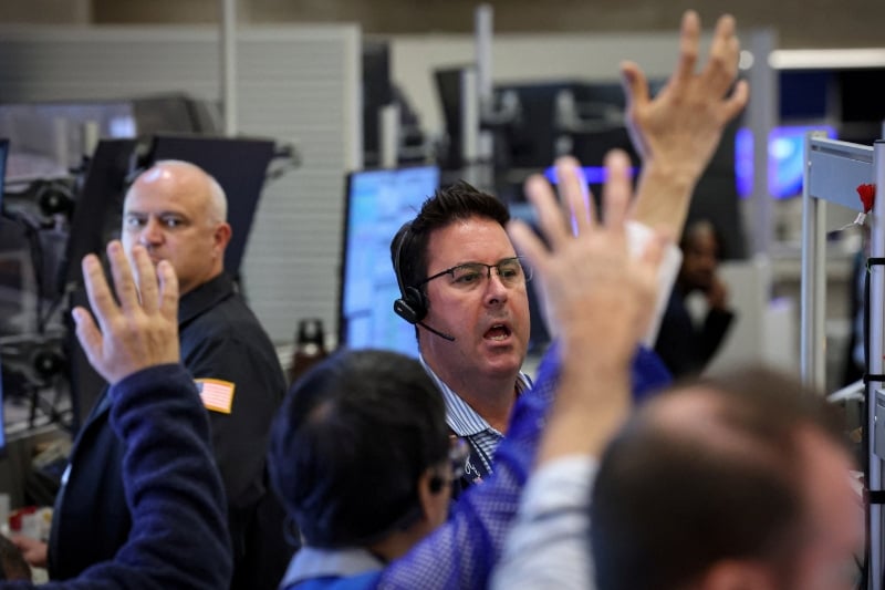 Wall St slips after hotter-than-expected producer inflation data