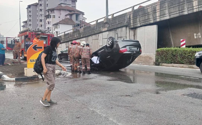 Woman injured as car hits raised road fixture, overturns in PJ