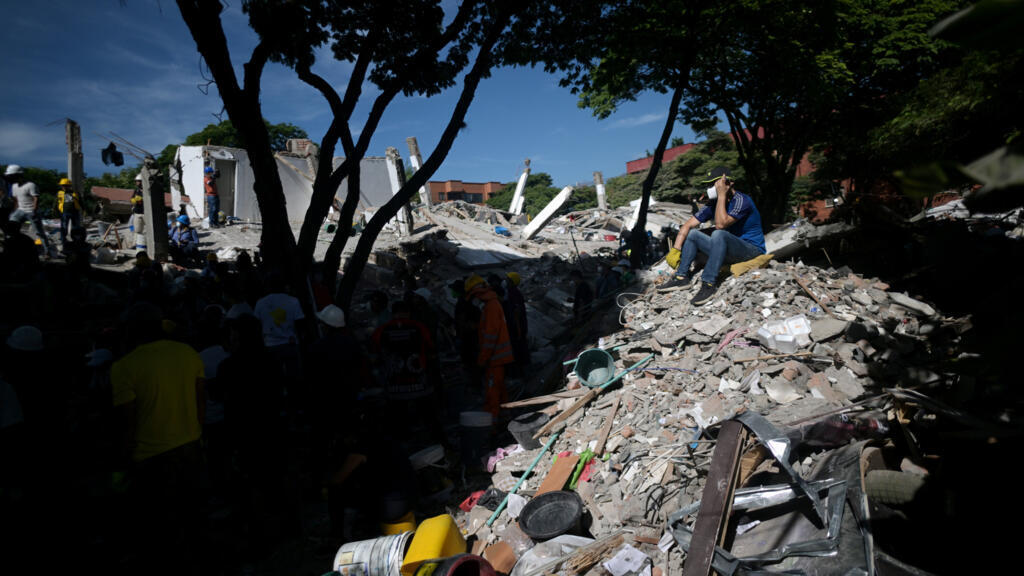 Colombia declares three days of mourning as search for quake survivors continues