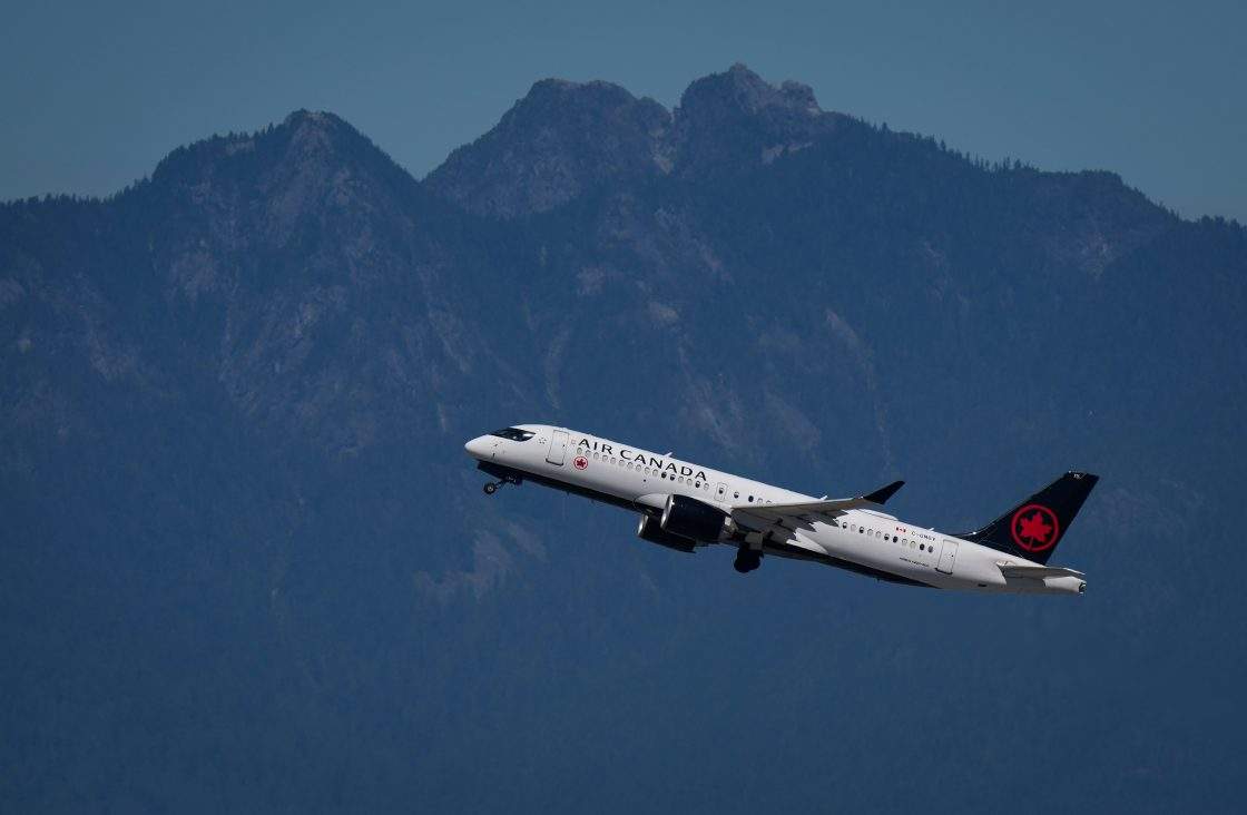 Air Canada says fuel costs spiked 49% from last year, with travel demand up