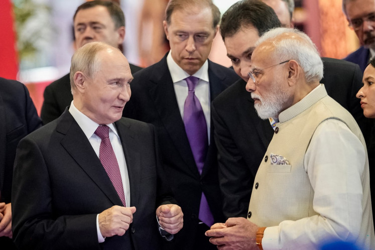 Modi, Putin seek stronger ties as Russia calls for BRICS to counter West