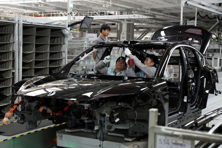 Trump says he would be OK with China building cars in US