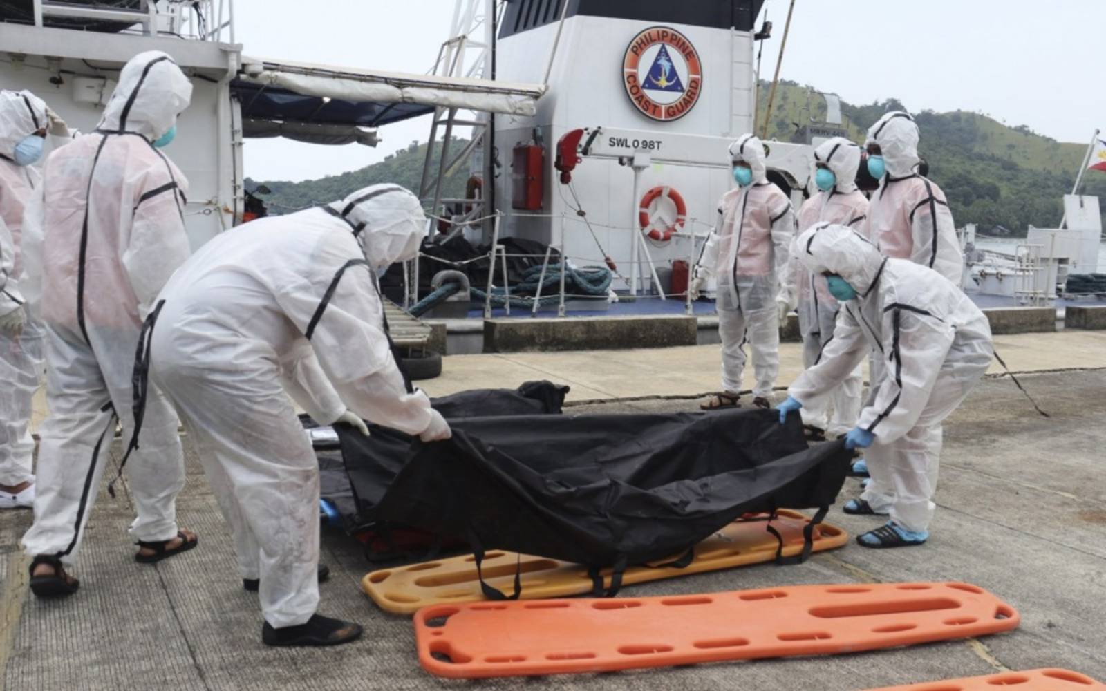 Philippines begins identifying victims from ferry fire as dozens still missing