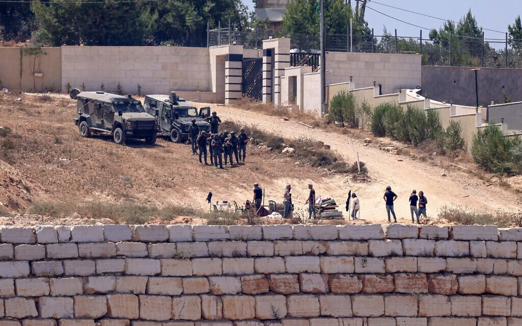 From Ohio, a Palestinian American watches as settlers besiege his family in Qusra