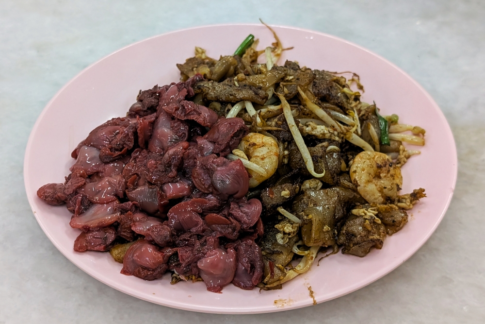 Enjoy a satisfying plate of ‘char kuey teow’ from Pei Yin Char Kuey Teow at 111 Bee Fatt Restaurant, Damansara Utama
