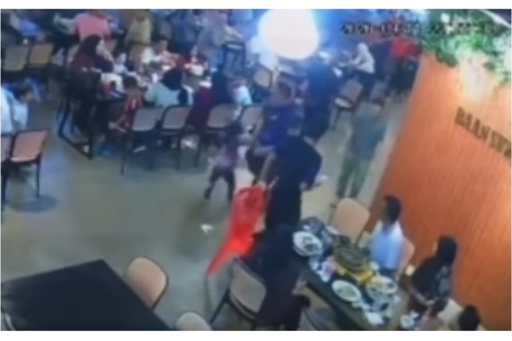 Kota Bharu police seek man seen kicking young girl in restaurant CCTV video
