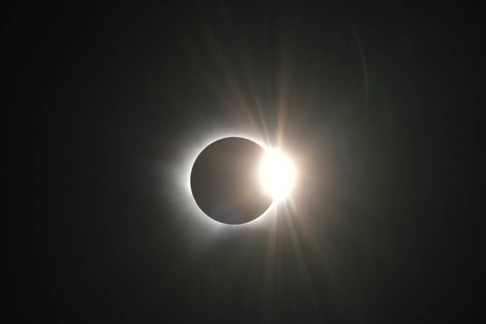 Rare solar eclipse crosses Europe, bringing total darkness to Spain