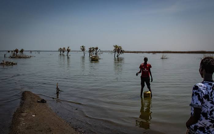 Natural cycle, increase in rainfall amounts and catchments degradation causing lake overflow