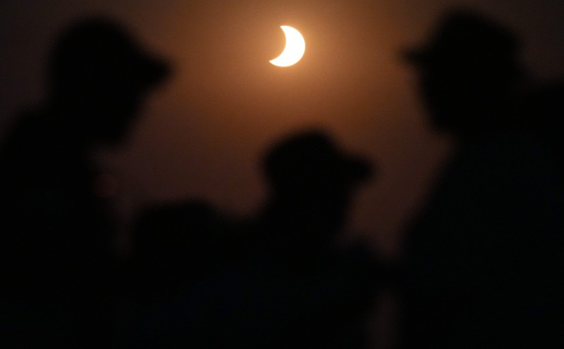 Spain darkens as solar eclipse races south from Arctic