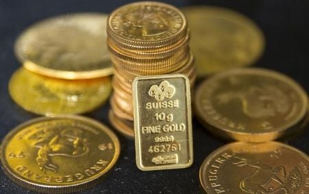 Gold slips as hotter US inflation lifts Fed hike bets, oil stokes price pressures