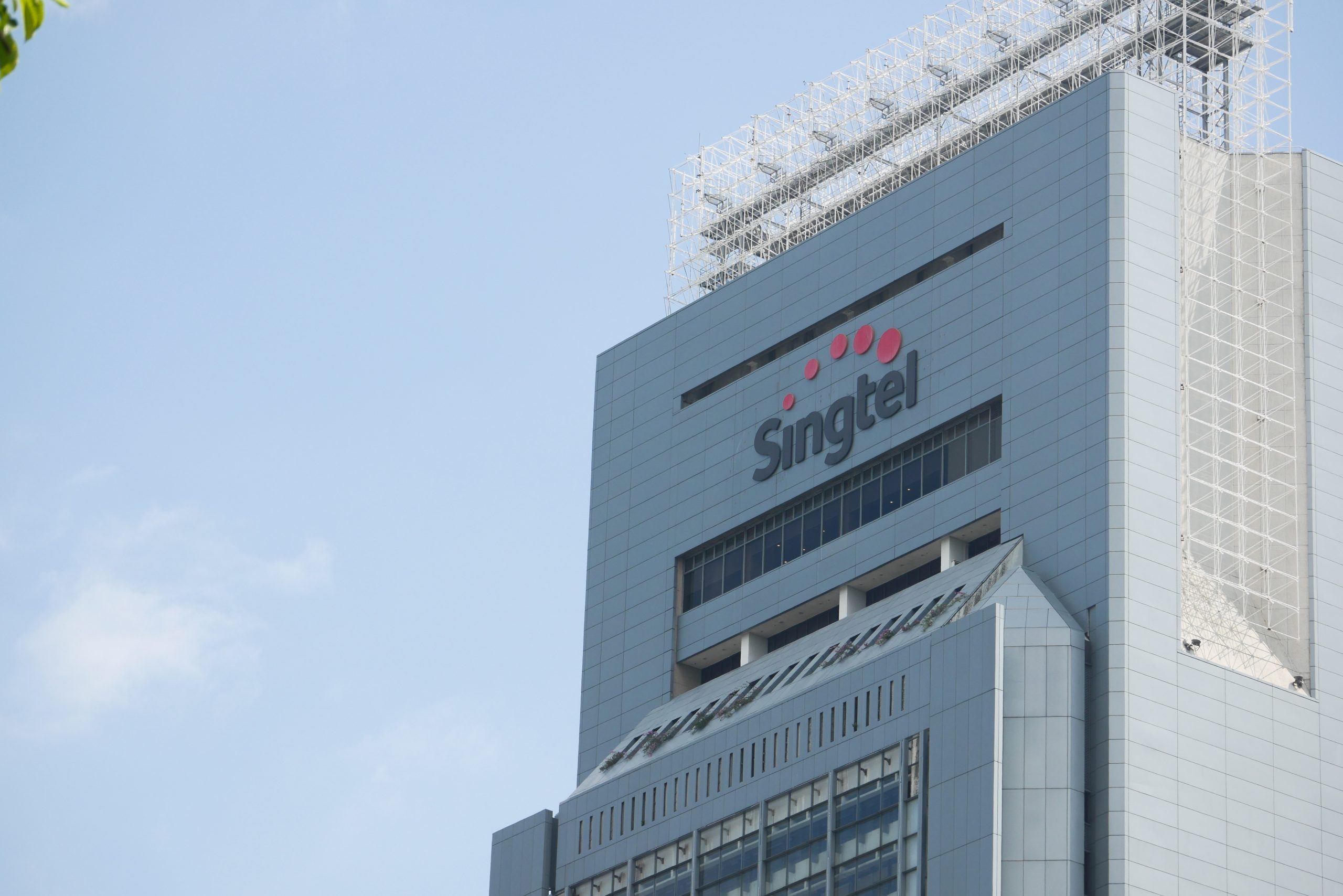 Singtel profit rises 21%, beats estimates