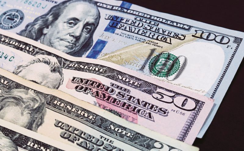 Dollar grinds higher, yen near 7-month high ahead of Fed, BOJ meetings