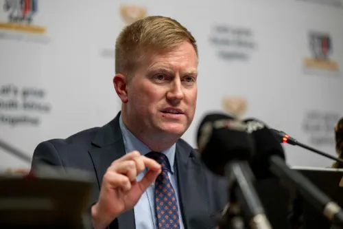 Macpherson defends hotel bill as cheaper than ministerial residence