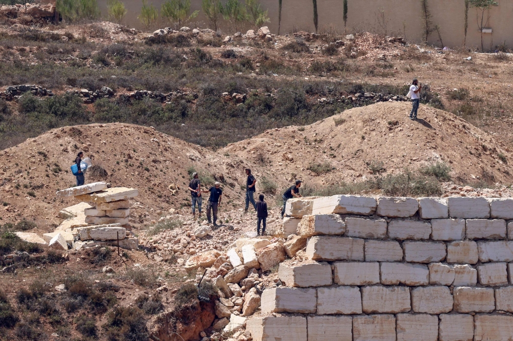 Israeli settlers defy army, keep Palestinian families under siege in West Bank