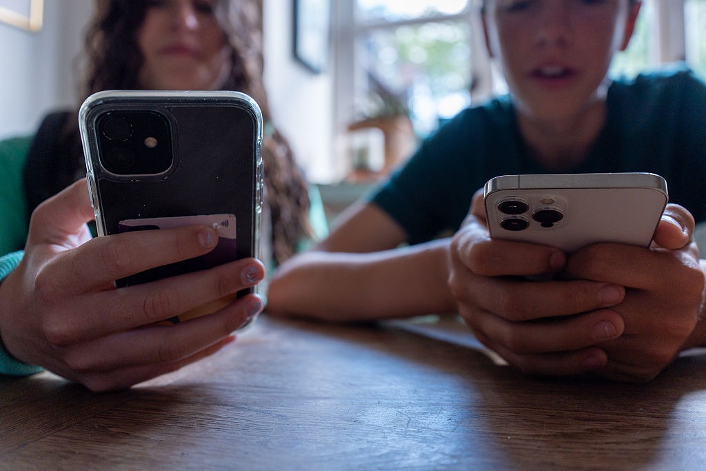 THE CONVERSATION: We can’t quit smartphones, but we can manage digital junk food better