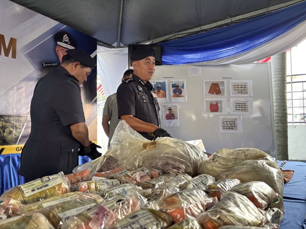 Meth, heroin and cannabis worth RM18,500 found inside a Lumut police cell, and a cop's in trouble too