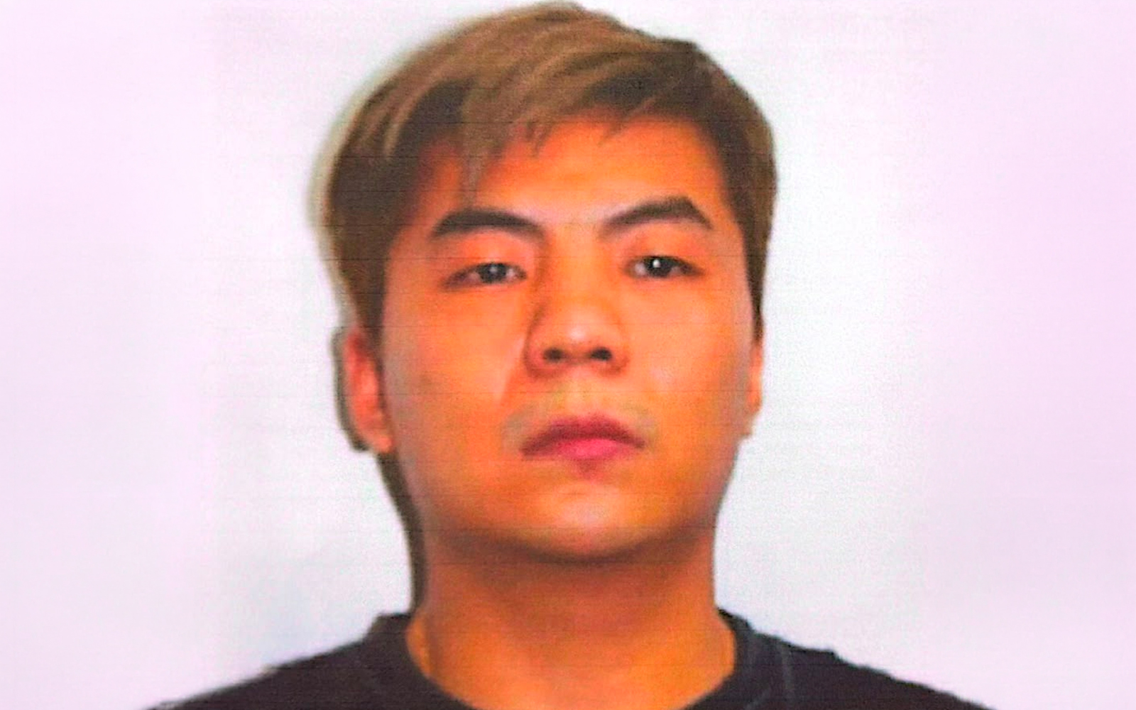 Chinese national Huang Zhixin wanted by cops